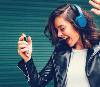 girl with headphones dancing