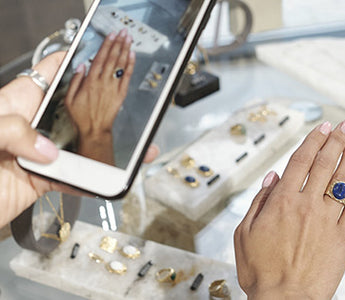 Women tries on ring