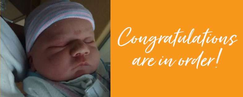 Photo of baby with the word "congratulations are in order